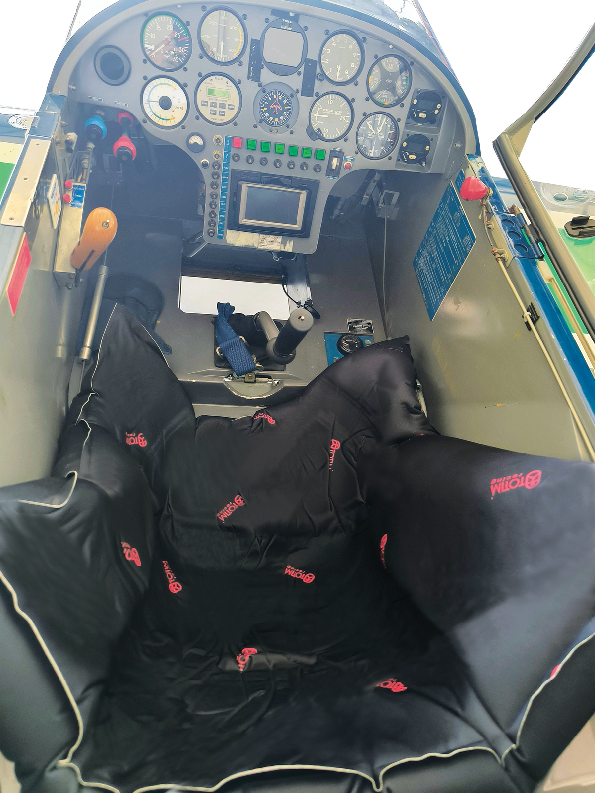 TOTIM foam seat insert fitted in aerobatic aircraft cockpit